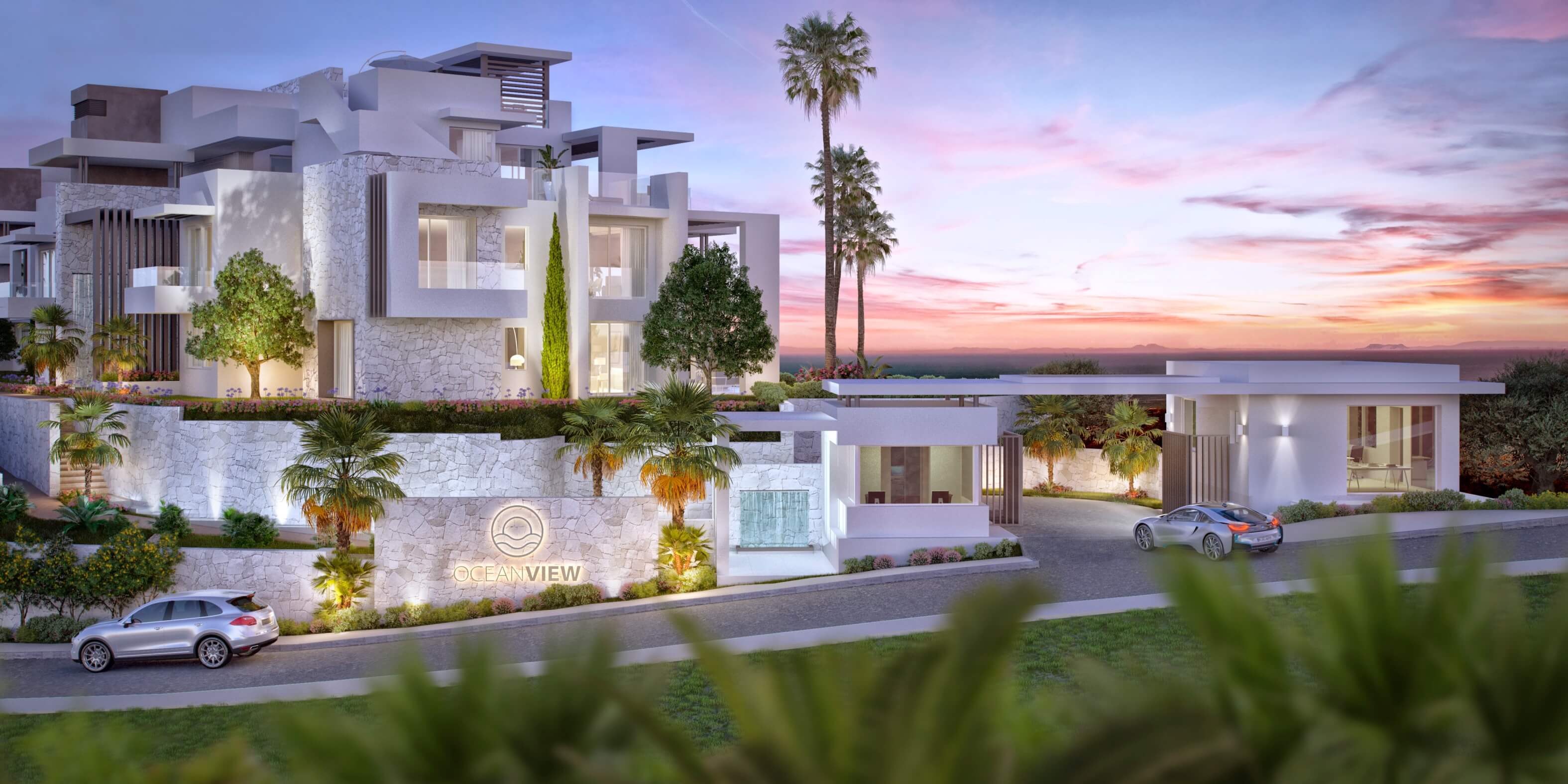 Ingang van Ocean View Marbella bij avondlicht