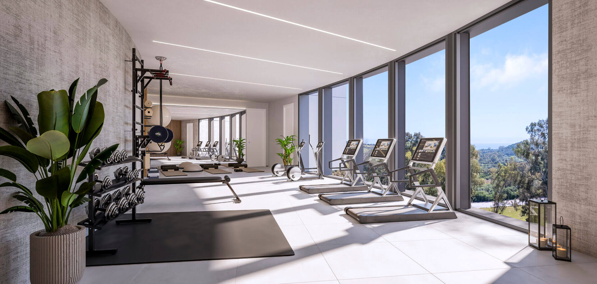 Fitnessruimte met zicht op de golfbaan