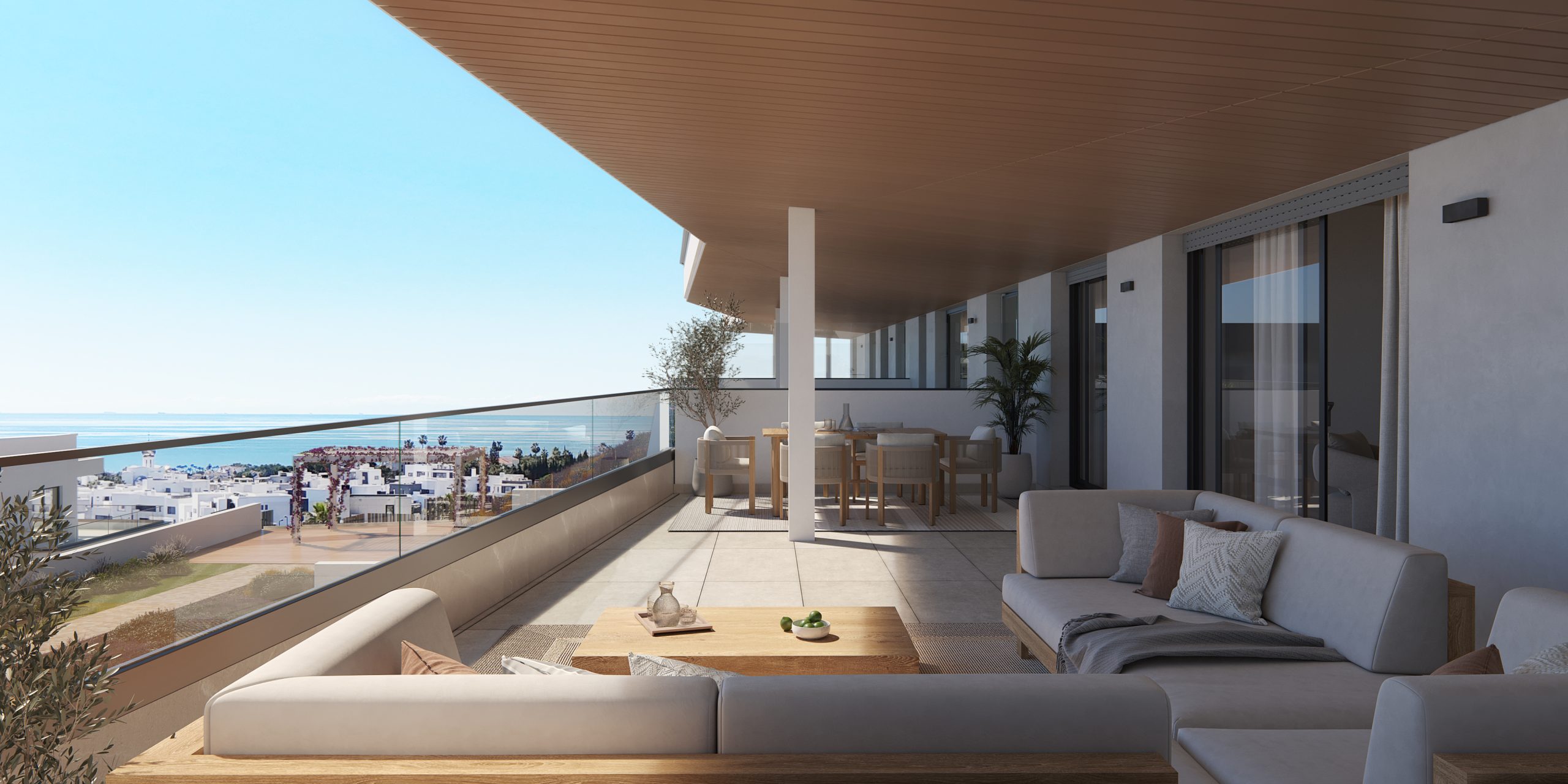 Terras met loungezetels en zeezicht
